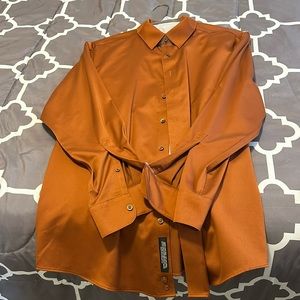 Pumpkin colored- brand new dress shirt. Bought the wrong size…